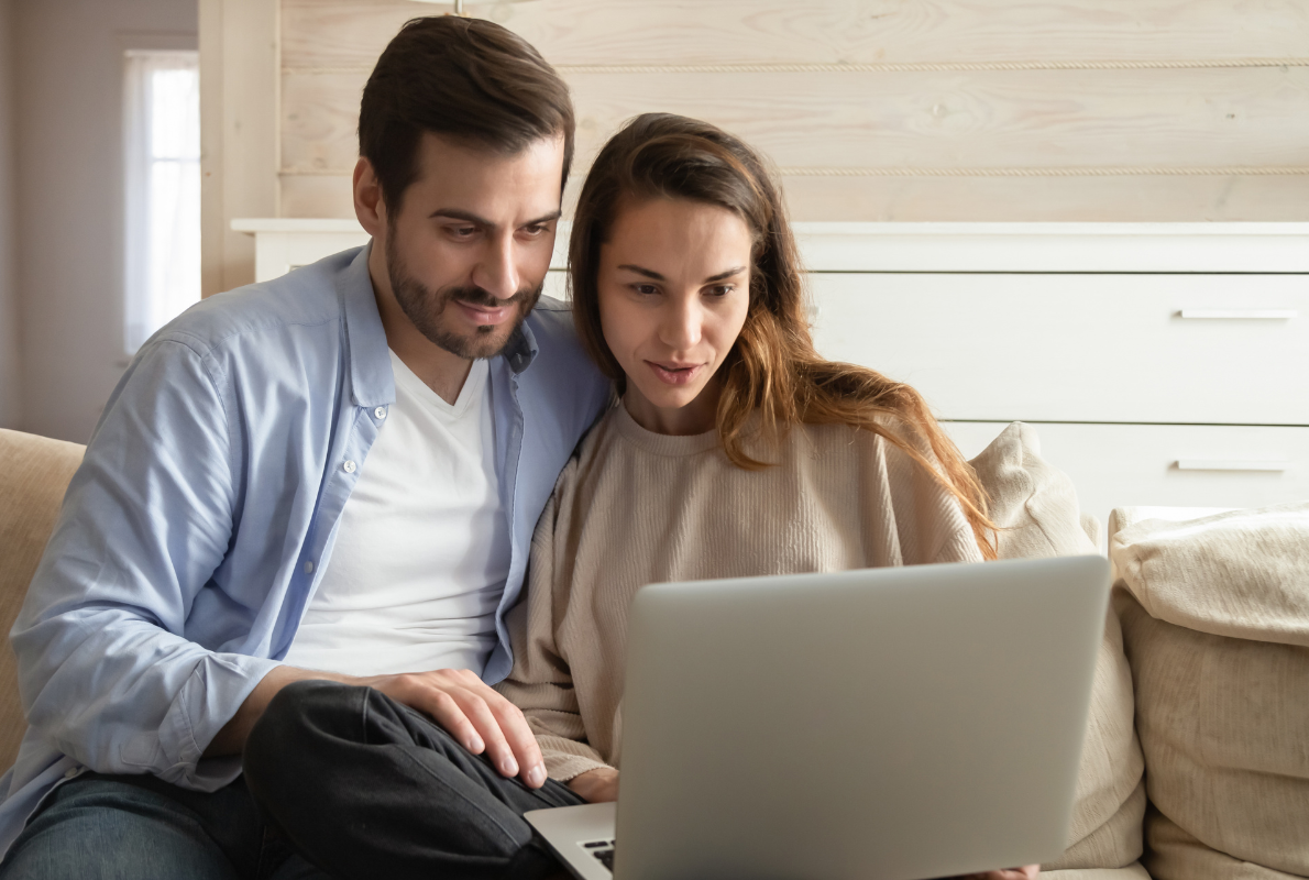 Image of a couple using a laptop to access healthcare information