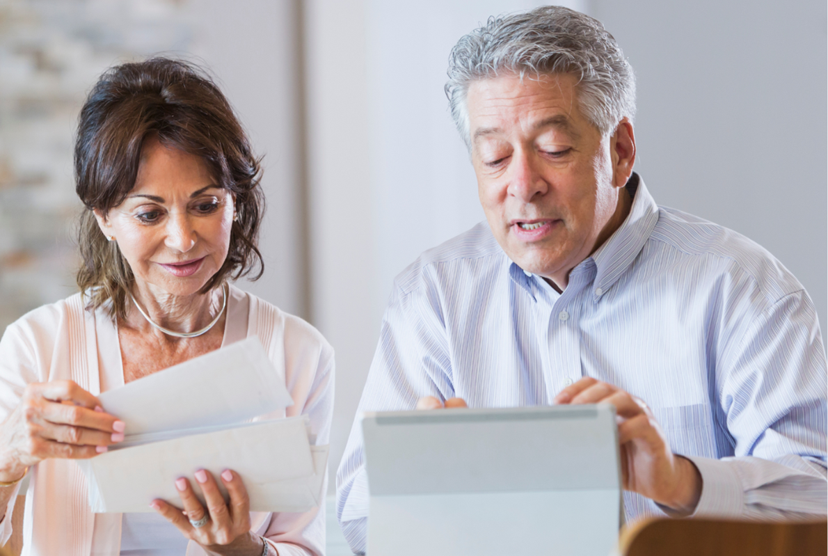 Image of an older couple paying their health care bill easily online